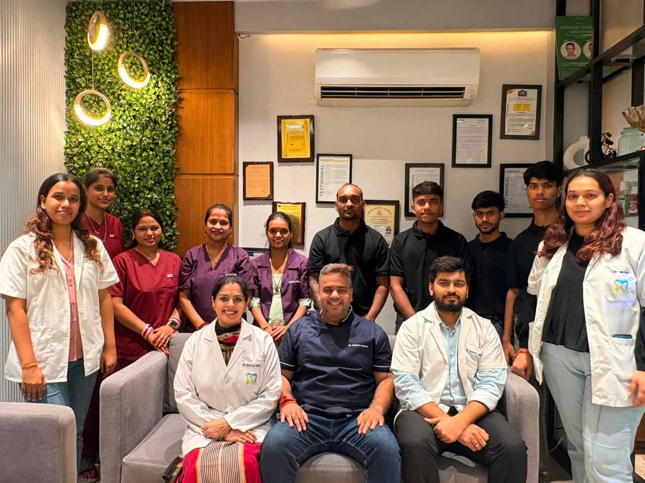 The I M Dentist doctors and clinic team